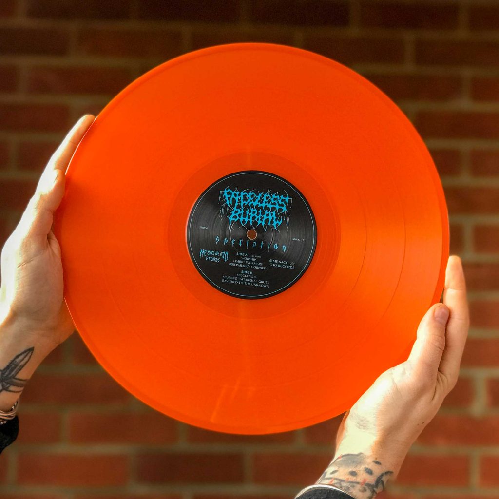 A photo of the Speciation vinyl in Orange Crush colour